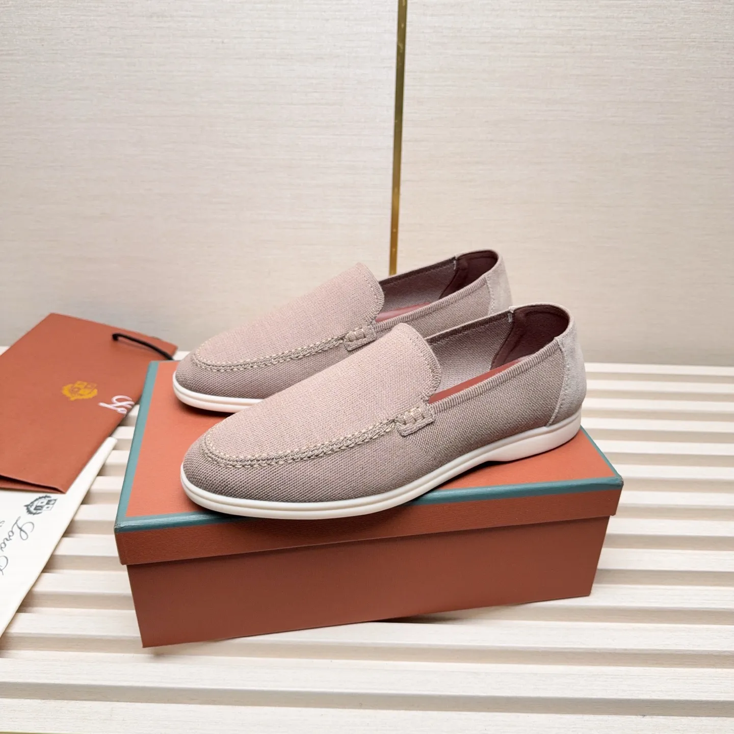 Men's Men's Shoes 💰400 Loro PIana moccasins are made of wish wool fabric. The upper is made of knitted fabric, made on a loom, and then attached to a rubber sole. The Rain System's water-repellent treatment enhances the shoe's functional design, while the suede details give the shoe a sense of elegance and sophistication. Made from Wish, fine wool from Australian and New Zealand Merino sheep
